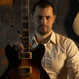 Anatoly Garkin with a guitar
